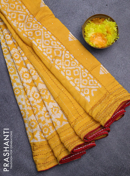 Batik cotton saree yellow and red with allover batik prints & sequin work and kantha stitch work border