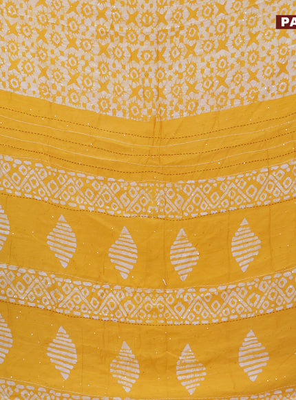 Batik cotton saree yellow and red with allover batik prints & sequin work and kantha stitch work border