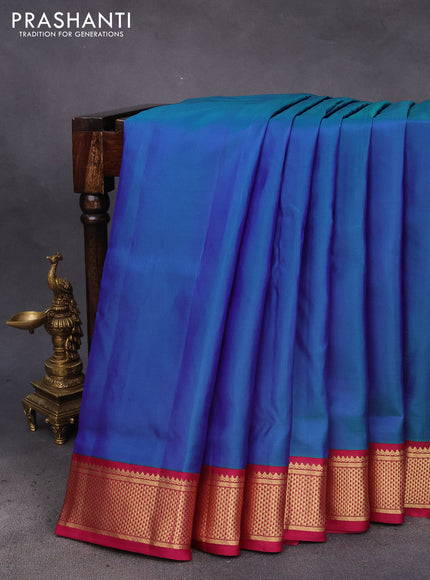 10 Yards silk saree dual shade of bluish green and dark magenta pink with plain body and zari woven korvai border