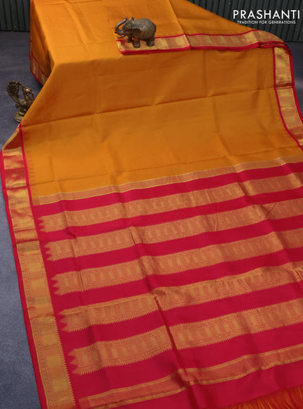 10 Yards silk saree mustard yellow and pink with plain body and temple design zari woven border