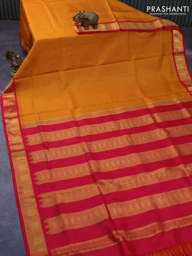 10 Yards silk saree mustard yellow and pink with plain body and temple design zari woven border