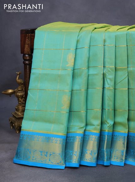 10 Yards silk cotton saree teal green and cs blue with allover zari checks pattern & annam buttas and zari woven border