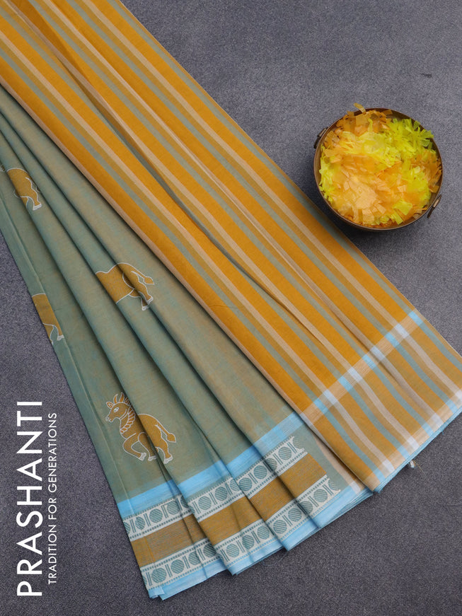 Chirala cotton saree dual shade of mustard and light blue with butta prints and printed border