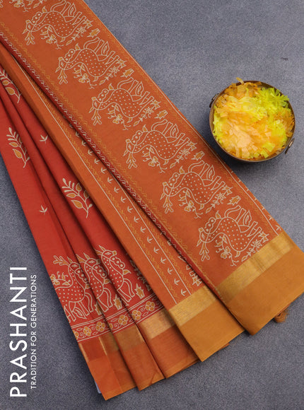 Chirala cotton saree rustic orange and mustard with butta prints and zari woven simple border