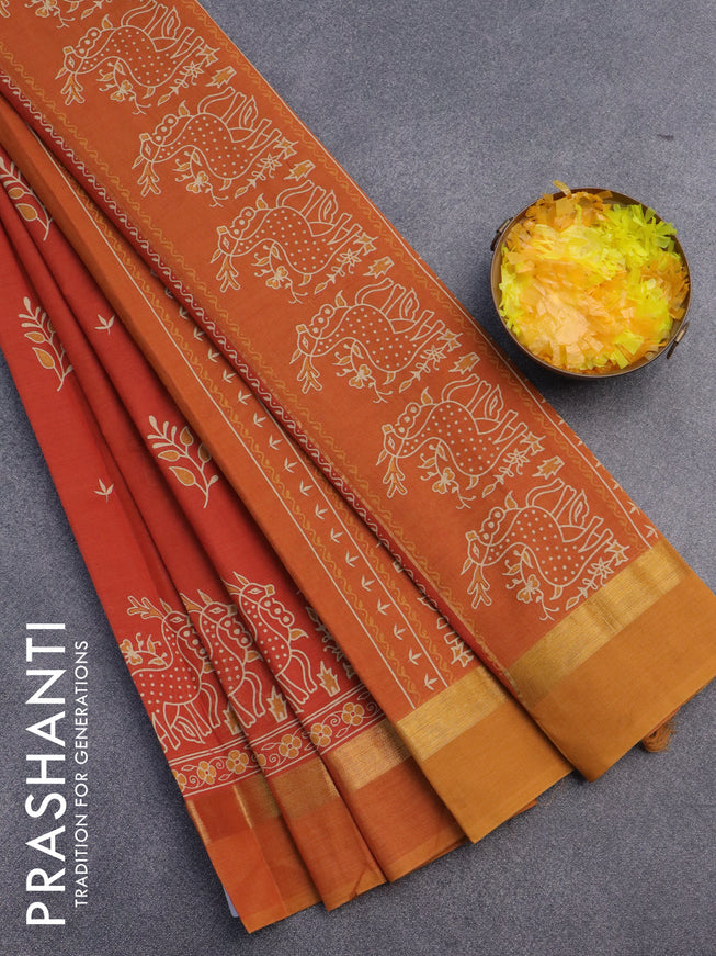 Chirala cotton saree rustic orange and mustard with butta prints and zari woven simple border