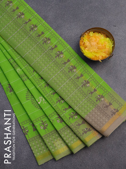 Chirala cotton saree light green and beige with warli butta prints and small zari woven border