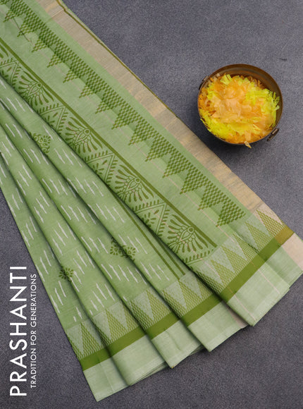 Chirala cotton saree light green with allover prints and temple design thread woven border