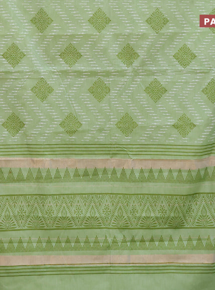 Chirala cotton saree light green with allover prints and temple design thread woven border