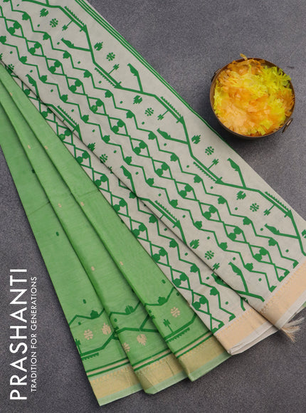 Chirala cotton saree light green with butta prints and zari woven border