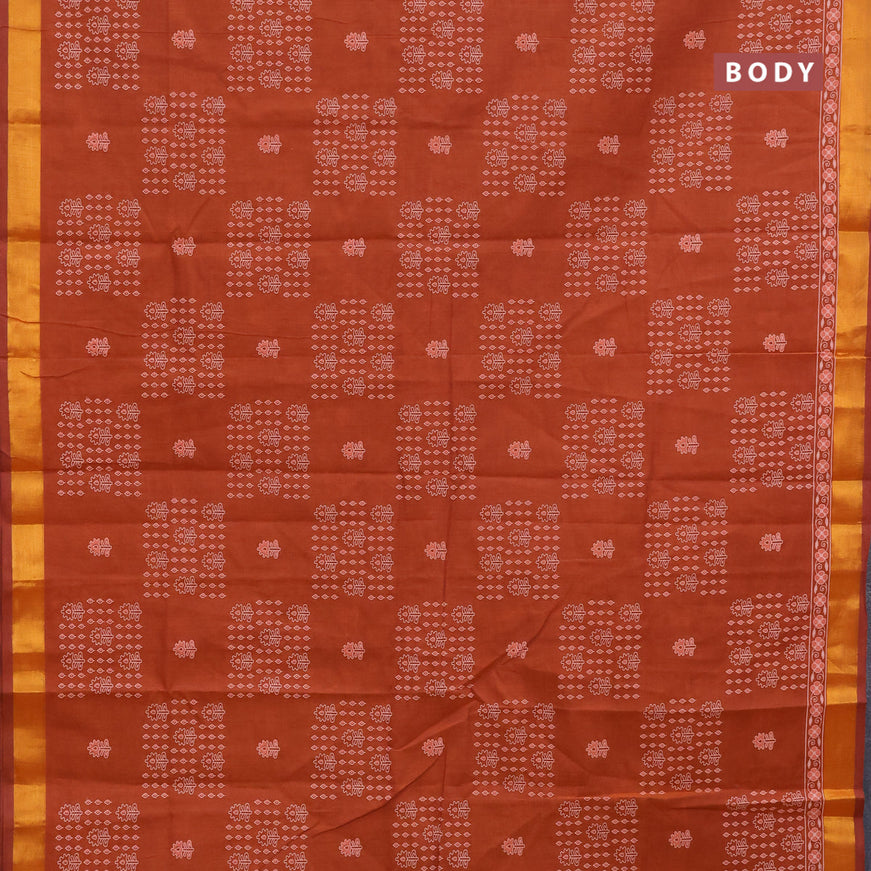 Chirala cotton saree rustic orange with allover prints and zari woven border