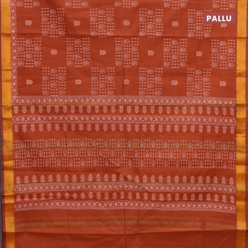 Chirala cotton saree rustic orange with allover prints and zari woven border