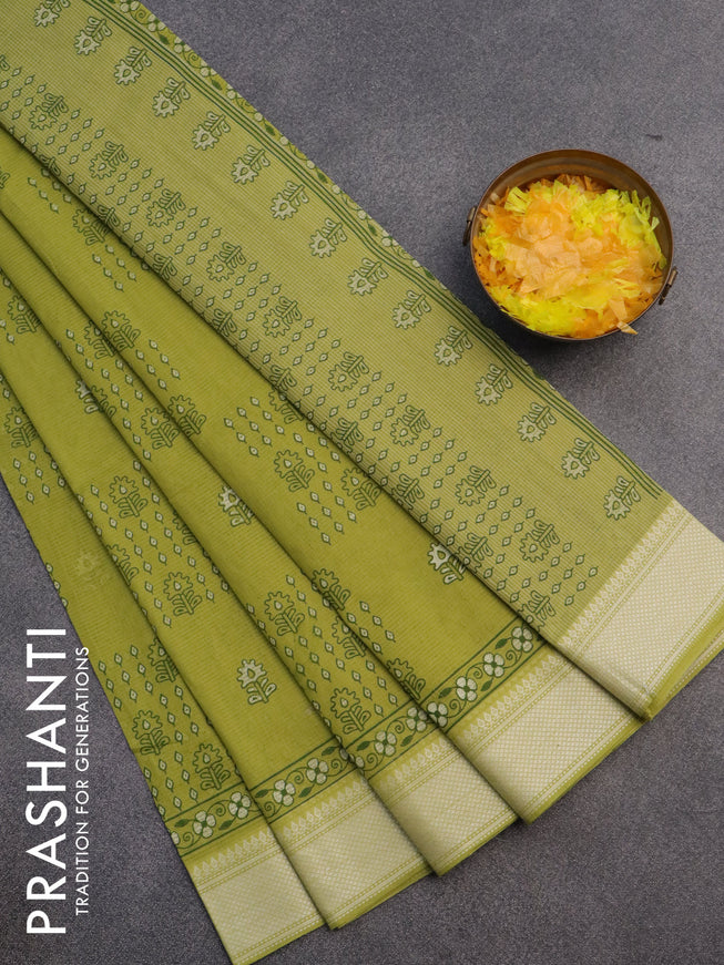 Chirala cotton saree light green with allover prints and thread woven border