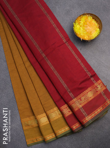 10 Yards poly cotton saree dark mustard and maroon with plain body and rettapet zari woven border