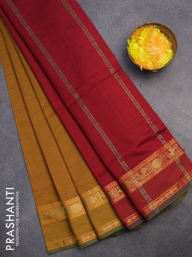 10 Yards poly cotton saree dark mustard and maroon with plain body and rettapet zari woven border