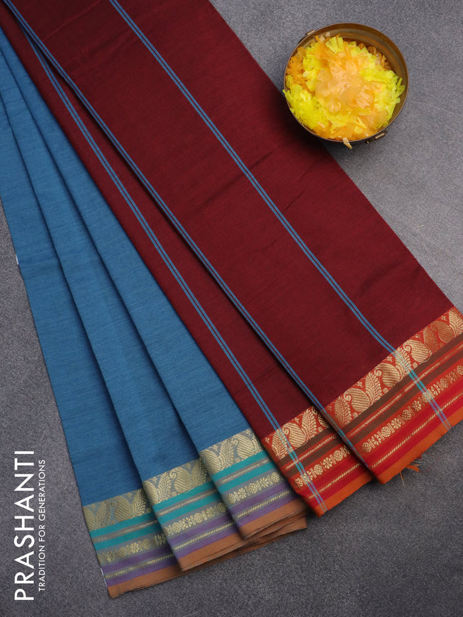 10 Yards poly cotton saree blue shade and maroon with plain body and zari woven border