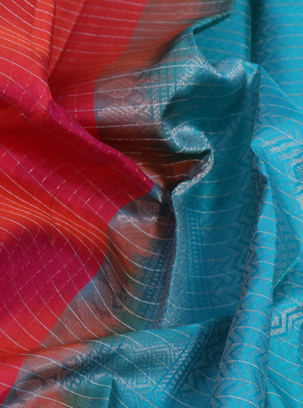 Pure soft silk saree dual shade of pinkish orange and teal blue with allover zari checked pattern and zari woven border