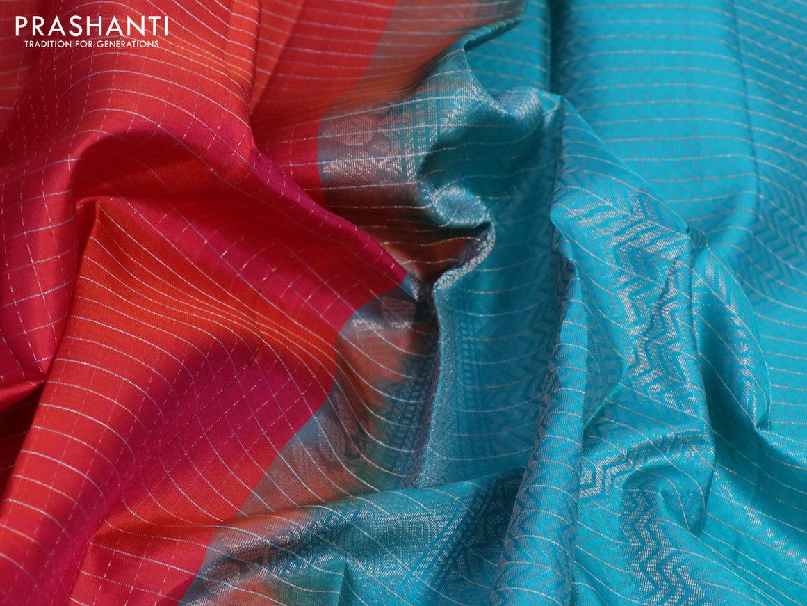 Pure soft silk saree dual shade of pinkish orange and teal blue with allover zari checked pattern and zari woven border