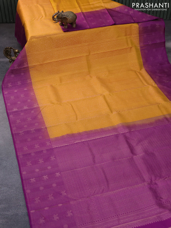 Pure soft silk saree mango yellow and purple with allover zari woven brocade weaves and zari woven border