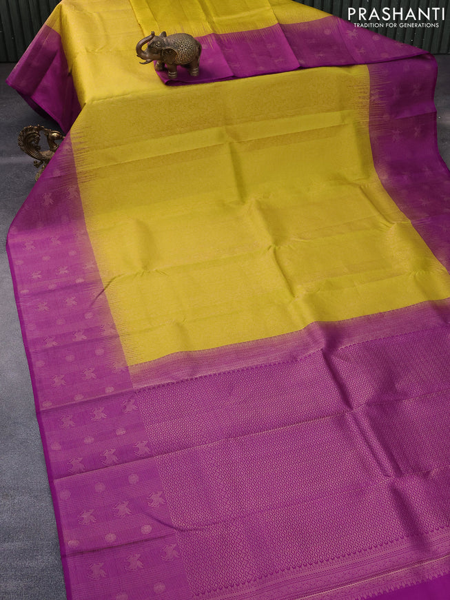 Pure soft silk saree yellow and purple with allover zari woven brocade weaves and zari woven border