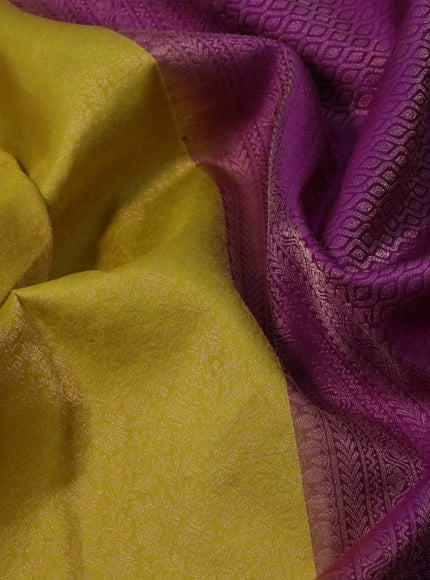 Pure soft silk saree yellow and purple with allover zari woven brocade weaves and zari woven border