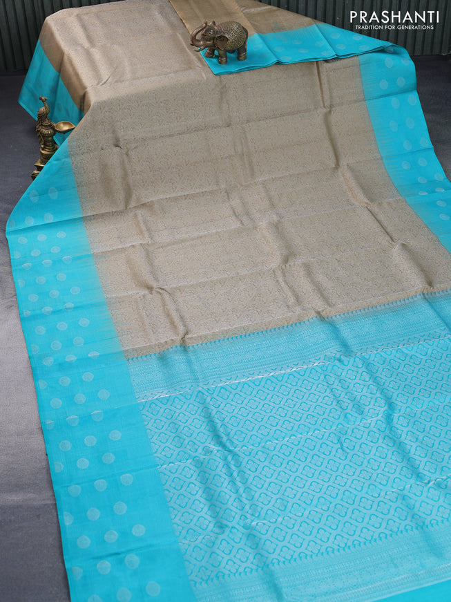 Pure soft silk saree elaichi green and teal blue with allover silver zari woven brocade weaves and silver zari woven butta border