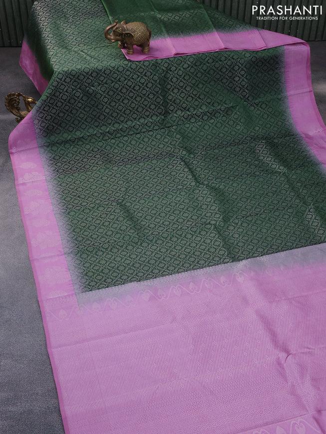 Pure soft silk saree green and mauve pink with allover silver zari woven brocade weaves and silver zari woven butta border