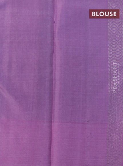 Pure soft silk saree green and mauve pink with allover silver zari woven brocade weaves and silver zari woven butta border