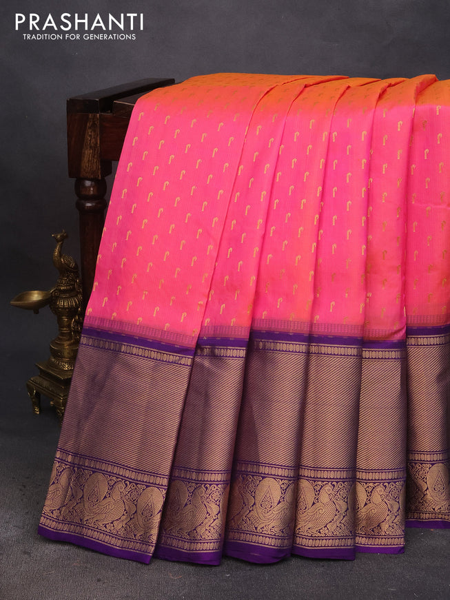 Pure soft silk saree dual shade of pinkish orange and violet with allover zari woven buttas and long annam zari woven border