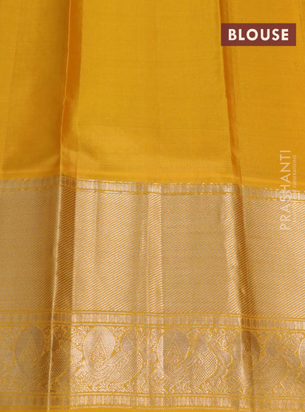 Pure soft silk saree black and mango yellow with allover zari woven buttas and long annam zari woven border