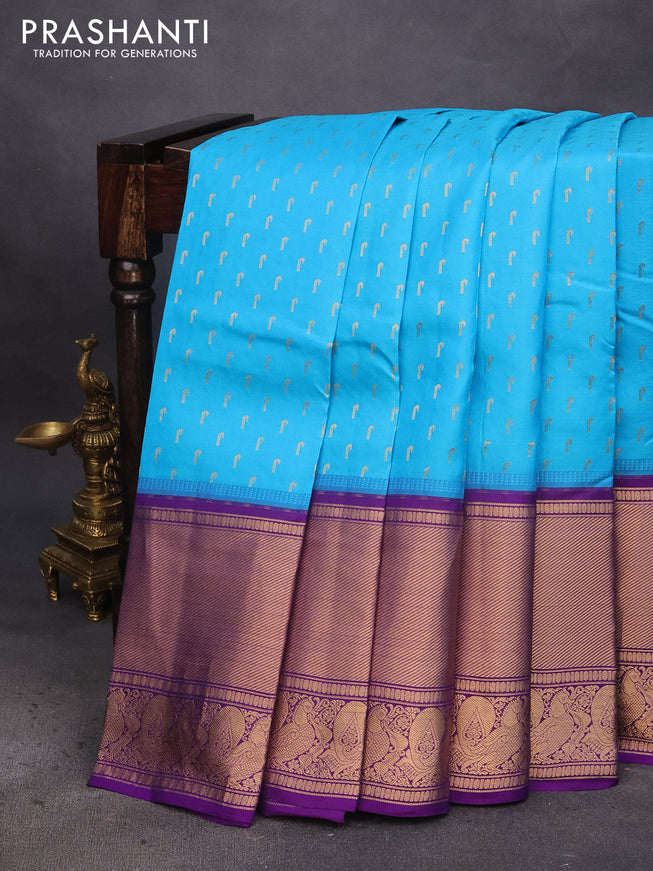 Pure soft silk saree light blue and violet with allover zari woven buttas and long annam zari woven border