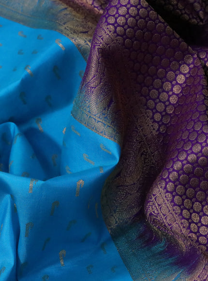 Pure soft silk saree light blue and violet with allover zari woven buttas and long annam zari woven border