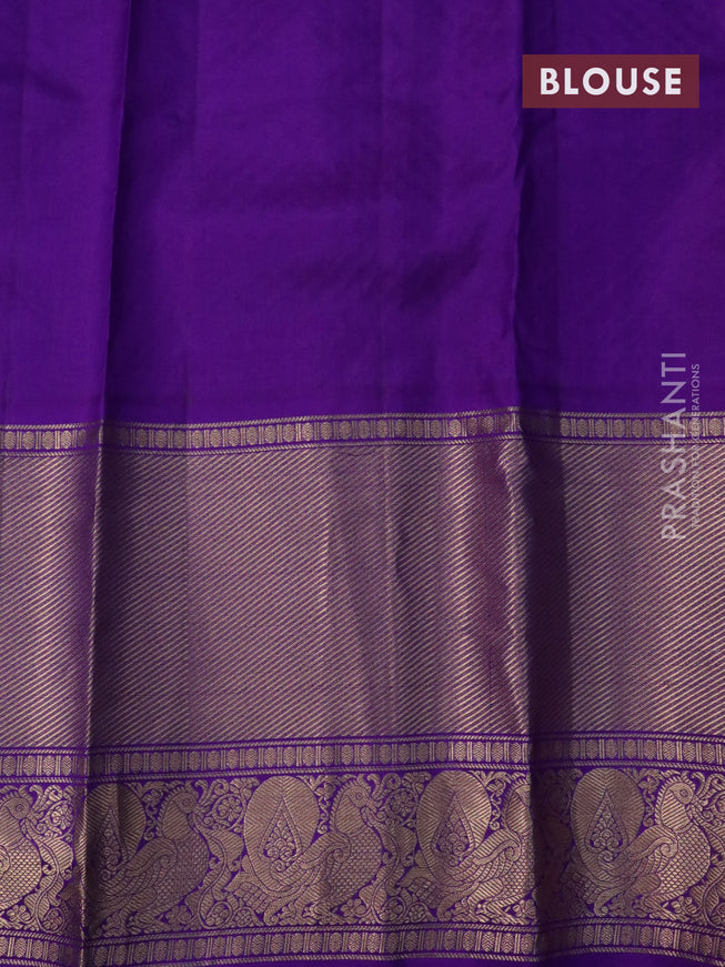 Pure soft silk saree light blue and violet with allover zari woven buttas and long annam zari woven border