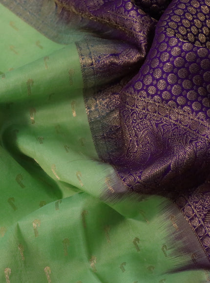 Pure soft silk saree pista green and violet with allover zari woven buttas and long annam zari woven border