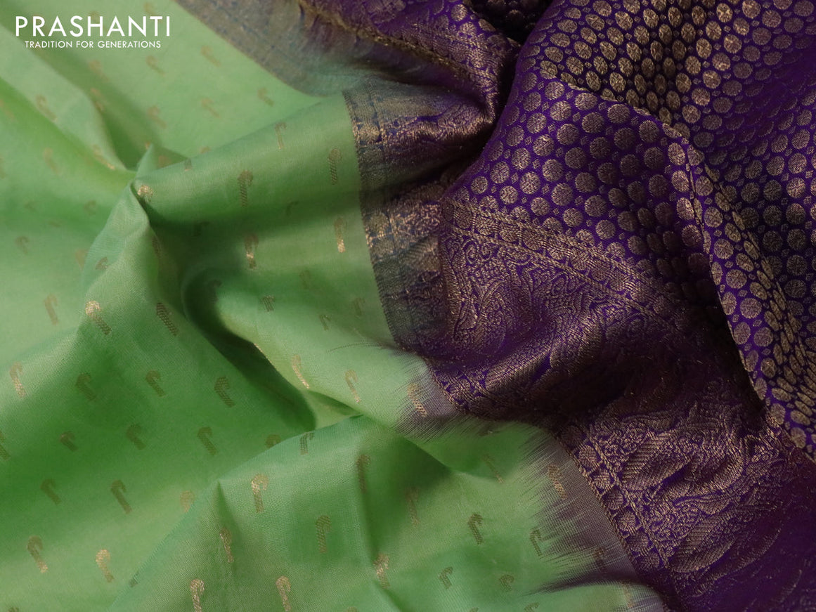 Pure soft silk saree pista green and violet with allover zari woven buttas and long annam zari woven border