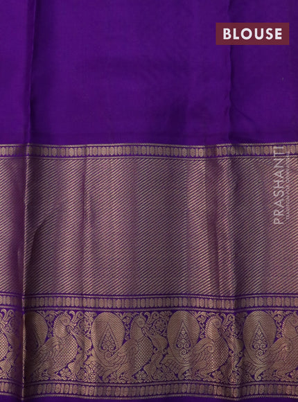 Pure soft silk saree pista green and violet with allover zari woven buttas and long annam zari woven border