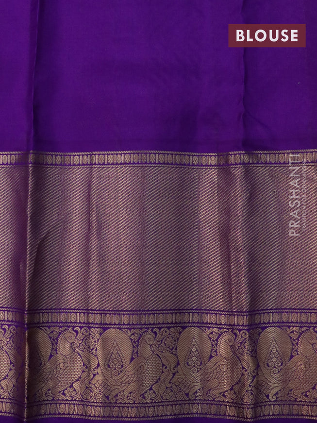 Pure soft silk saree pista green and violet with allover zari woven buttas and long annam zari woven border