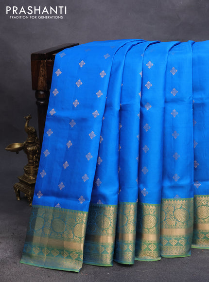 Pure soft silk saree cs blue and light green with zari woven buttas and floral zari woven border