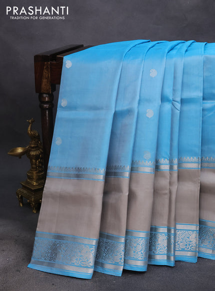 Pure soft silk saree light blue and grey with silver zari woven paisley buttas and long rettapet silver zari woven border