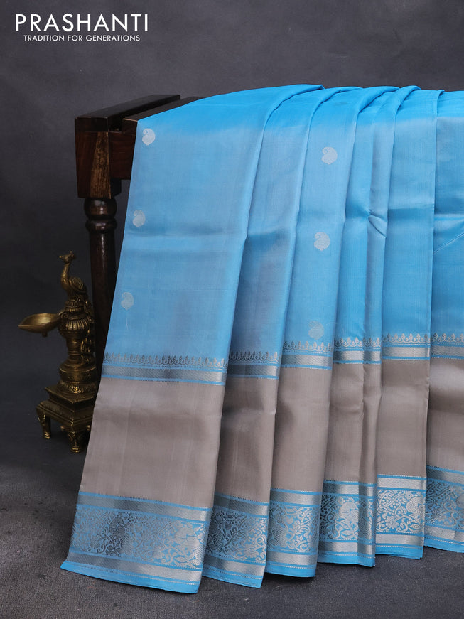 Pure soft silk saree light blue and grey with silver zari woven paisley buttas and long rettapet silver zari woven border