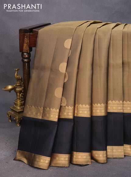 Pure soft silk saree elaichi green and black with zari woven buttas and rettapet zari woven border