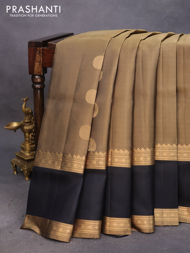 Pure soft silk saree elaichi green and black with zari woven buttas and rettapet zari woven border