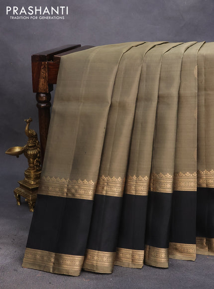 Pure soft silk saree elaichi green and black with zari woven buttas and rettapet zari woven border