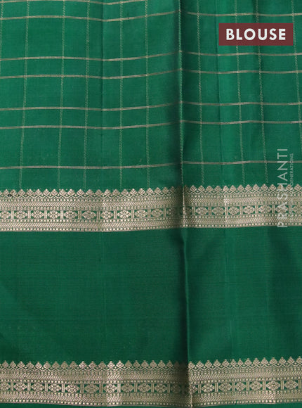 Pure soft silk saree bottle green and green with allover zari checks and rettapet zari woven border