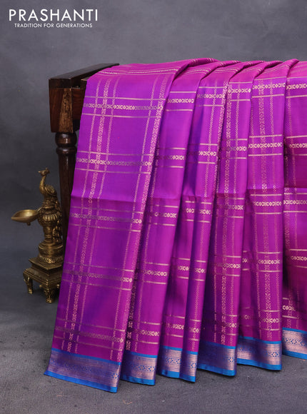 Pure soft silk saree purple and dual shade of blue with allover copper zari checked pattern and zari woven border