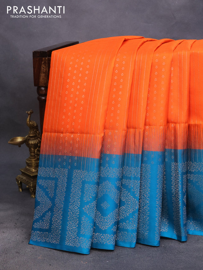 Pure soft silk saree orange and peacock blue with allover zari weaves and zari woven simple border