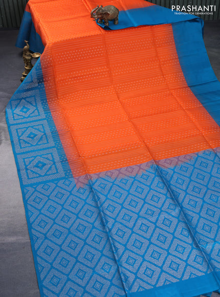 Pure soft silk saree orange and peacock blue with allover zari weaves and zari woven simple border