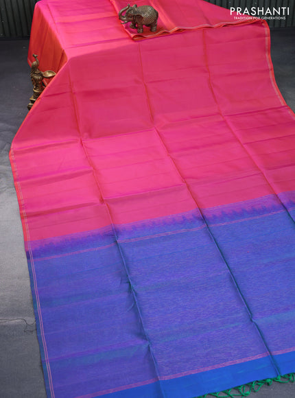 Pure soft silk saree dual shade of pinkish orange and dual shade of bluish green with plain body and small zari woven border