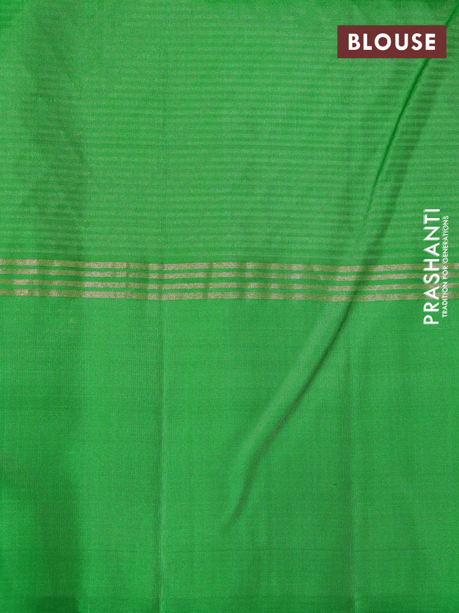 Pure soft silk saree dual shade of pinkish orange and green with zari woven buttas and zari woven simple border