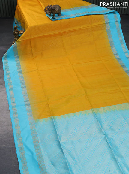 Pure soft silk saree mustard yellow and light blue with allover small zari checked pattern and rettapet zari woven border