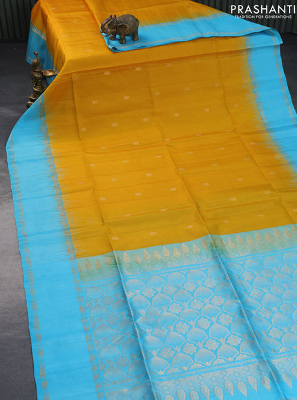 Pure soft silk saree mango yellow and light blue with zari woven buttas and rettapet zari woven border